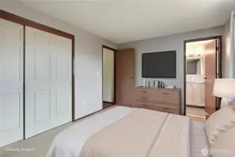 Main floor primary bedroom with ensuite bath and large closets!