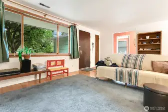 Living room with hardwoods & fireplace