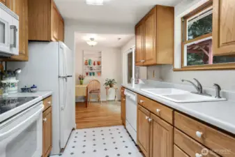 Kitchen looking out on deck & Back yard.