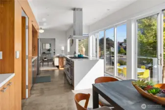 The "great room" encompasses the stunning kitchen, dining area, and media room.