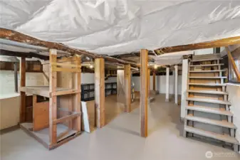 Unfinished basement has room for all your gear & projects!