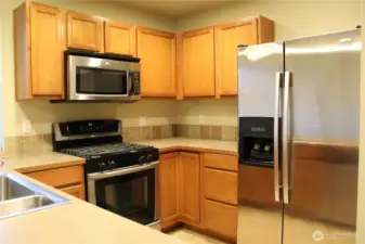 Beautiful well maintained cabinetry and stainless steel appliances