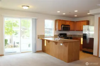 Only townhome with both a front door porch and sliding door back patio to nature and trails