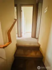 Upstairs to 2 bedrooms and 1 full bath