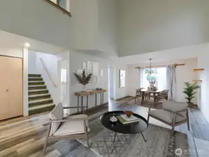 Welcome home!  View from front door.  Great room space, the hub of the home.  Virtually staged.