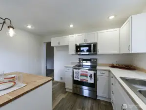 View from slider.  Entrance shown goes to living room and stairs.