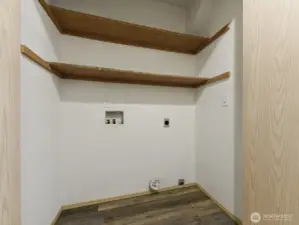 Laundry on main floor, right across from 1/2 bath on the way to the garage.