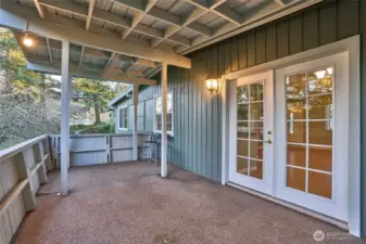 Another View of the Large Covered Deck and French Doors Leading out to the Deck.