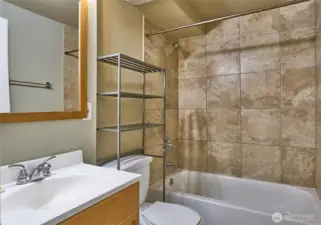Downstairs Full Bathroom with Tile Surround Shower.