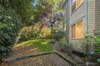 Mature landscaping surrounds the home. Easy guest parking to the side and front of the home.