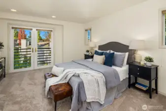 Spacious primary suite with private balcony