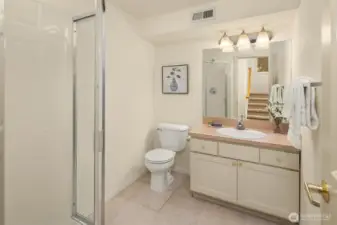 3/4 bath just outside the bedroom door