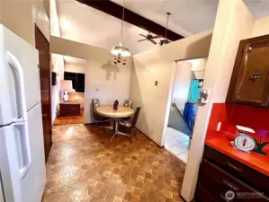 Main level kitchen capturing cathedral ceilings. Reconfigure for today's more open kitchen to capture more views and natural light!