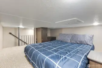 Loft sleeping area with storage