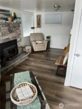 Intimate living room with cozy wood fire insert.