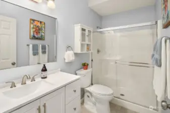 This bath on the main level has a shower and is right next to the guest bedroom.
