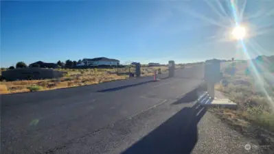 Gated enterance into Desert Hills Community, First Lot on the Right Mailboxes on the right.