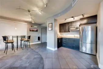 Another photo of the community room with kitchen.