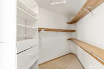 Walk-in closet in primary bedroom.