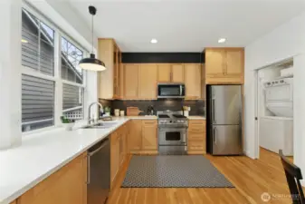 The renovated modern kitchen. The entire home has been freshly painted inside.