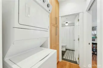 The main floor laundry area behind the kitchen. Cabinetry was added to this space during the kitchen renovation.