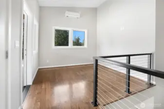 Great space for a library nook or game table area?