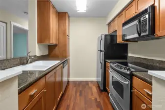 Cherry Cabinets, Granite Countertops & Stainless Steel Appliances