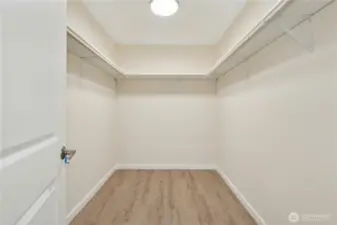 Primary bedroom large walk in closet