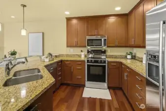 Large kitchen with abundant storage.