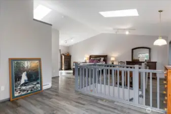 Looking toward bed from the sitting area.