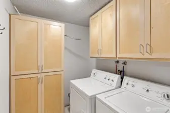 Extra storage in Laundry room. Washer/Dryer convey