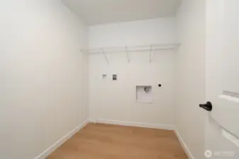 Upstairs Utility Room - Pics are of a different 2389 Kyler plan home. Features and colors may differ.