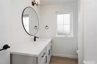 Upstairs Guest Bathroom - Pics are of a different 2389 Kyler plan home. Features and colors may differ.