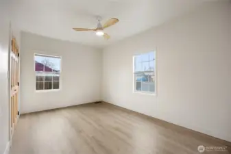 Two windows with custom blinds & new fan