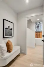 Ground level walkthrough closet to garage