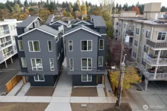 Shared driveway to access auto-court and garages