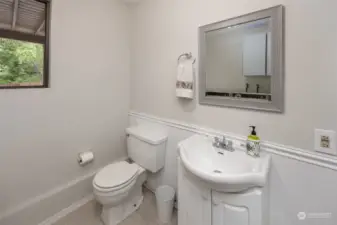 Lower bathroom with laundry