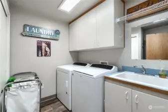 Large laundry room with sink