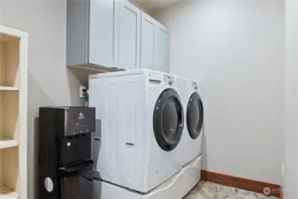 large laundry room with rom for additional storage