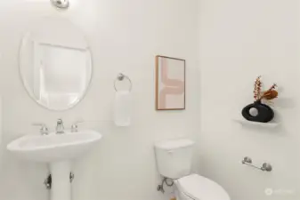 Powder room off the kitchen on the 2nd level.