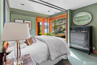 Lower level view bedroom with ensuite bathroom & patio access