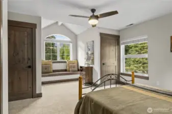 Bedroom 2 with seating area.