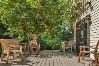Back deck off the kitchen/dining area on the western side of the home.