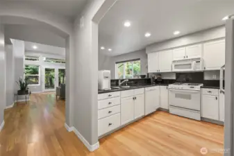 Beautiful kitchen with granite countertops, gas range, and plenty of cabinet space.