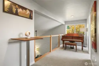 Newer carpet upstairs and newer railing in loft area.  Great area for music/arts or reading nook.