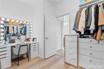 The walk-in closet of your dreams in the primary bedroom