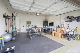 Large, clean garage and home includes an electric vehicle charger!