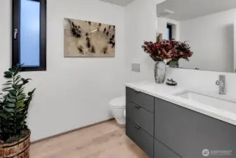 Powder Room off Kitchen & Living Room