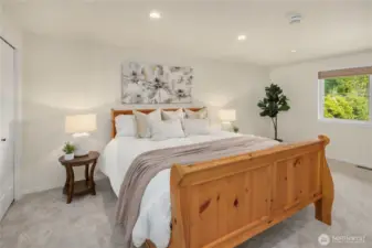 Primary bedroom with peek-a-boo lake views