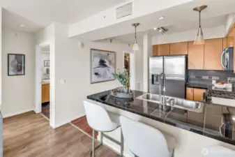 Gorgeous chef's kitchen, New Gas Range, Samsung Fridge, Granite Counters and Art Deco lighting including undercabinet & overhead Pendant w/Day Bar seating!